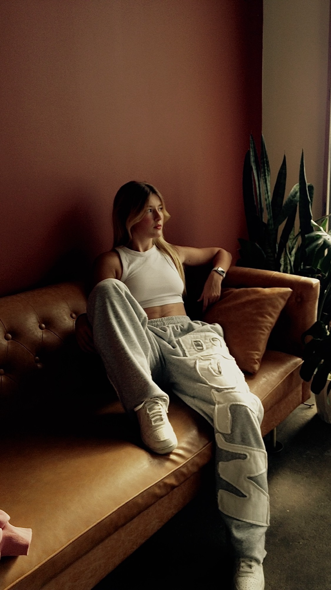 Editorial portrait on a leather couch
